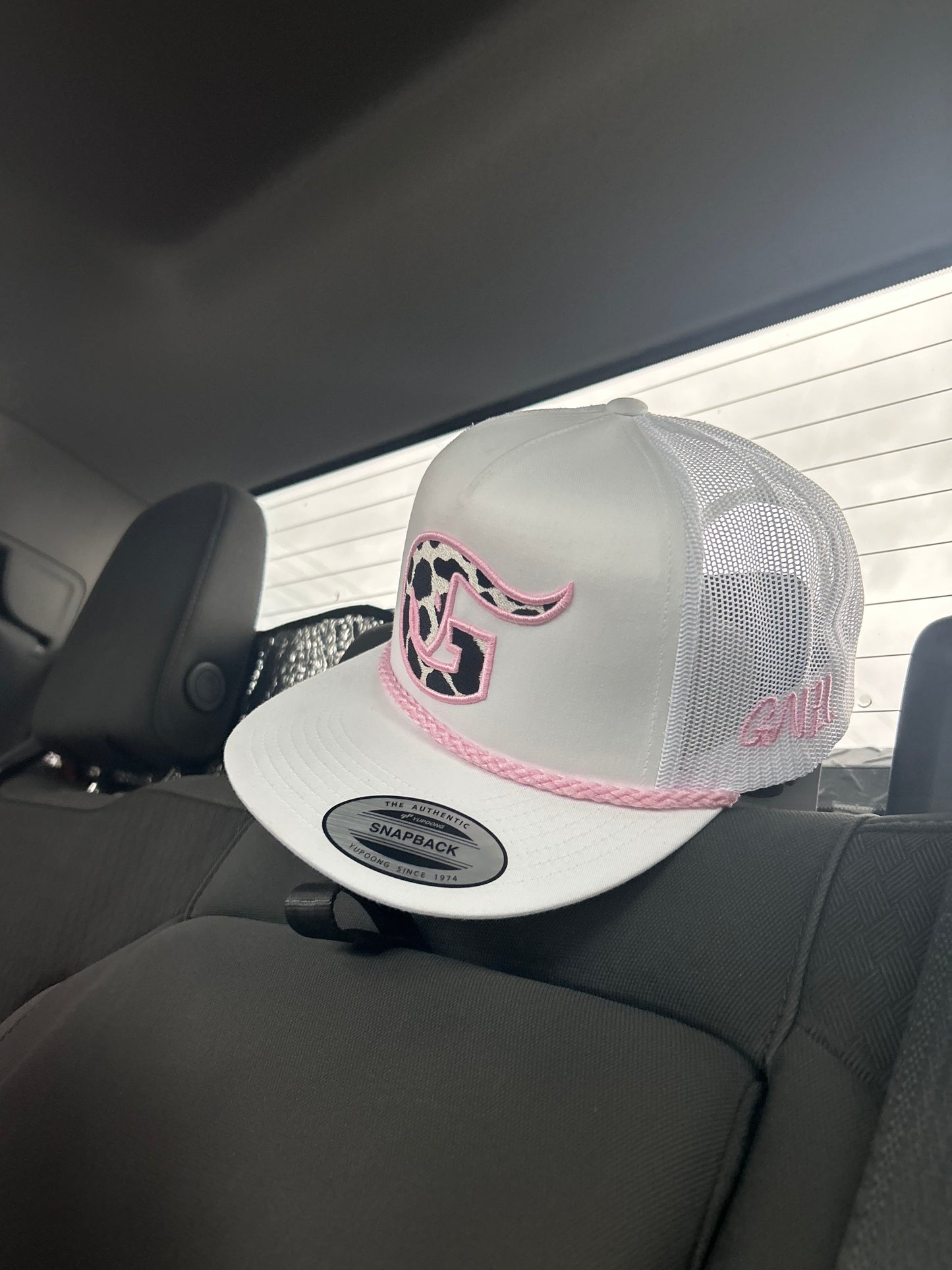 White/pink cow-print cap